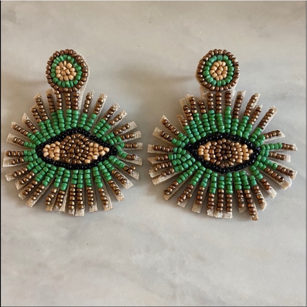 Green eyes statement earrings